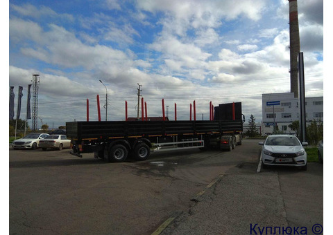Полуприцеп сортиментовоз Политранс 9417-040